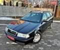 Черный Шкода Октавия, объемом двигателя 1.6 л и пробегом 156 тыс. км за 5799 $, фото 1 на Automoto.ua