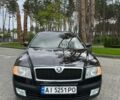 Черный Шкода Октавия, объемом двигателя 1.6 л и пробегом 285 тыс. км за 6300 $, фото 1 на Automoto.ua