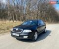Чорний Шкода Октавія, об'ємом двигуна 2 л та пробігом 391 тис. км за 4400 $, фото 1 на Automoto.ua