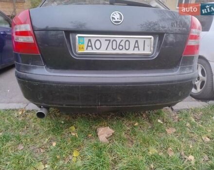 Черный Шкода Октавия, объемом двигателя 1.6 л и пробегом 303 тыс. км за 3900 $, фото 9 на Automoto.ua