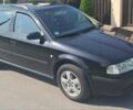 Черный Шкода Октавия, объемом двигателя 1.6 л и пробегом 209 тыс. км за 5800 $, фото 1 на Automoto.ua