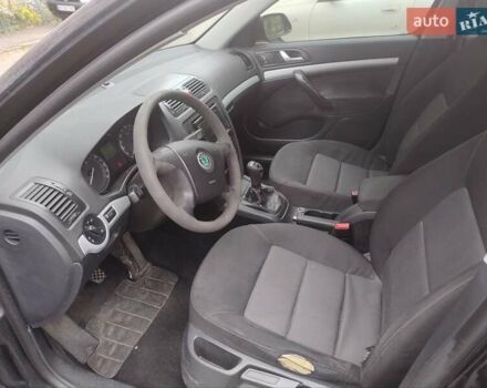 Черный Шкода Октавия, объемом двигателя 1.6 л и пробегом 303 тыс. км за 3900 $, фото 22 на Automoto.ua