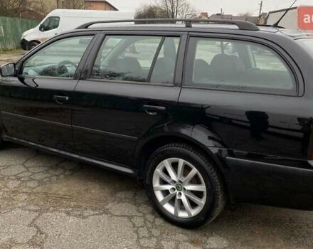 Черный Шкода Октавия, объемом двигателя 1.6 л и пробегом 206 тыс. км за 6300 $, фото 2 на Automoto.ua