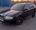 Чорний Шкода Октавія, об'ємом двигуна 1.6 л та пробігом 211 тис. км за 5600 $, фото 1 на Automoto.ua