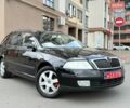 Черный Шкода Октавия, объемом двигателя 1.6 л и пробегом 210 тыс. км за 5950 $, фото 1 на Automoto.ua