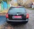 Черный Шкода Октавия, объемом двигателя 1.6 л и пробегом 241 тыс. км за 6100 $, фото 1 на Automoto.ua