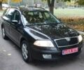 Черный Шкода Октавия, объемом двигателя 1.6 л и пробегом 241 тыс. км за 5300 $, фото 1 на Automoto.ua
