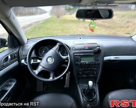 Черный Шкода Октавия, объемом двигателя 2 л и пробегом 235 тыс. км за 5999 $, фото 5 на Automoto.ua