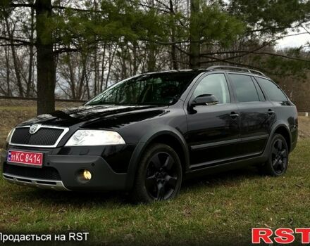 Черный Шкода Октавия, объемом двигателя 2 л и пробегом 235 тыс. км за 5999 $, фото 1 на Automoto.ua