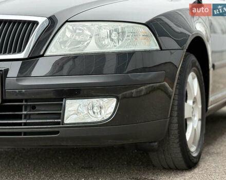 Черный Шкода Октавия, объемом двигателя 1.6 л и пробегом 211 тыс. км за 6500 $, фото 92 на Automoto.ua