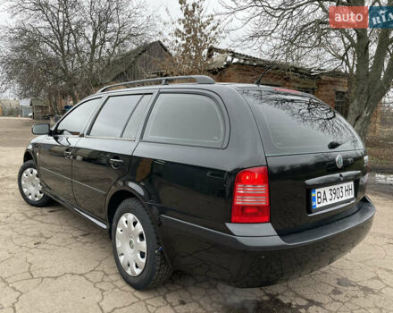 Черный Шкода Октавия, объемом двигателя 1.6 л и пробегом 260 тыс. км за 6100 $, фото 2 на Automoto.ua