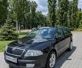 Черный Шкода Октавия, объемом двигателя 2 л и пробегом 306 тыс. км за 3026 $, фото 1 на Automoto.ua