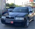 Черный Шкода Октавия, объемом двигателя 1.6 л и пробегом 273 тыс. км за 4890 $, фото 1 на Automoto.ua