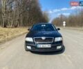 Черный Шкода Октавия, объемом двигателя 2 л и пробегом 391 тыс. км за 5100 $, фото 1 на Automoto.ua
