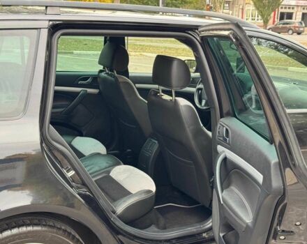 Черный Шкода Октавия, объемом двигателя 2 л и пробегом 250 тыс. км за 6990 $, фото 12 на Automoto.ua