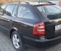 Черный Шкода Октавия, объемом двигателя 1.6 л и пробегом 216 тыс. км за 6999 $, фото 1 на Automoto.ua