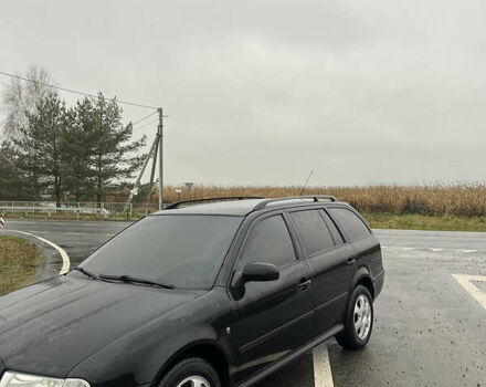 Чорний Шкода Октавія, об'ємом двигуна 1.6 л та пробігом 265 тис. км за 5800 $, фото 1 на Automoto.ua