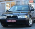 Черный Шкода Октавия, объемом двигателя 1.6 л и пробегом 194 тыс. км за 5490 $, фото 1 на Automoto.ua