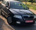 Черный Шкода Октавия, объемом двигателя 1.6 л и пробегом 230 тыс. км за 6800 $, фото 1 на Automoto.ua