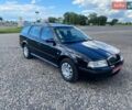 Черный Шкода Октавия, объемом двигателя 1.6 л и пробегом 265 тыс. км за 5750 $, фото 1 на Automoto.ua