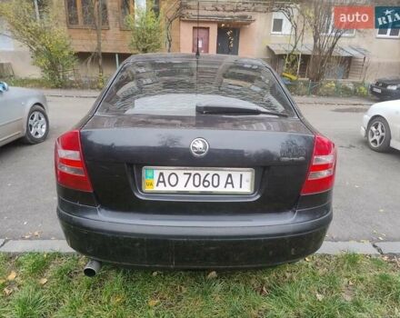 Черный Шкода Октавия, объемом двигателя 1.6 л и пробегом 303 тыс. км за 3900 $, фото 2 на Automoto.ua