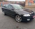 Черный Шкода Октавия, объемом двигателя 1.6 л и пробегом 203 тыс. км за 6400 $, фото 1 на Automoto.ua