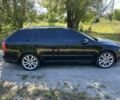 Чорний Шкода Октавія, об'ємом двигуна 2 л та пробігом 282 тис. км за 7998 $, фото 1 на Automoto.ua