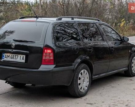 Чорний Шкода Октавія, об'ємом двигуна 1.6 л та пробігом 144 тис. км за 6999 $, фото 4 на Automoto.ua