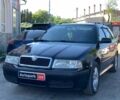 Черный Шкода Октавия, объемом двигателя 1.6 л и пробегом 273 тыс. км за 4990 $, фото 1 на Automoto.ua