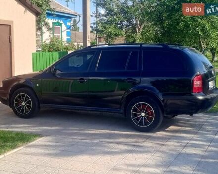 Чорний Шкода Октавія, об'ємом двигуна 1.6 л та пробігом 201 тис. км за 5800 $, фото 7 на Automoto.ua