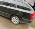 Черный Шкода Октавия, объемом двигателя 1.6 л и пробегом 218 тыс. км за 5800 $, фото 1 на Automoto.ua