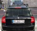 Черный Шкода Октавия, объемом двигателя 1.8 л и пробегом 218 тыс. км за 5600 $, фото 1 на Automoto.ua
