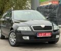 Черный Шкода Октавия, объемом двигателя 1.6 л и пробегом 209 тыс. км за 5999 $, фото 1 на Automoto.ua