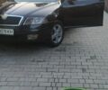 Черный Шкода Октавия, объемом двигателя 2 л и пробегом 301 тыс. км за 6000 $, фото 1 на Automoto.ua