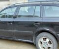 Черный Шкода Октавия, объемом двигателя 1.6 л и пробегом 200 тыс. км за 5700 $, фото 1 на Automoto.ua