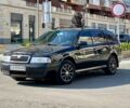 Черный Шкода Октавия, объемом двигателя 1.6 л и пробегом 312 тыс. км за 4999 $, фото 1 на Automoto.ua
