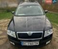Черный Шкода Октавия, объемом двигателя 1.6 л и пробегом 245 тыс. км за 6600 $, фото 1 на Automoto.ua
