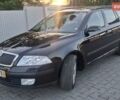 Черный Шкода Октавия, объемом двигателя 1.6 л и пробегом 216 тыс. км за 6999 $, фото 1 на Automoto.ua