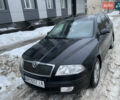 Черный Шкода Октавия, объемом двигателя 1.6 л и пробегом 114 тыс. км за 5700 $, фото 1 на Automoto.ua