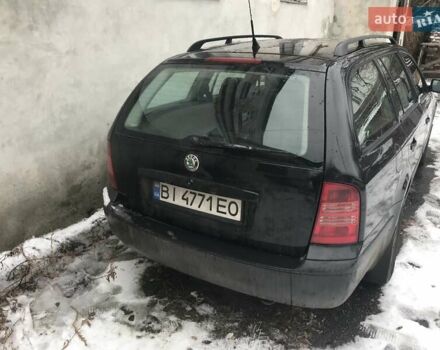 Черный Шкода Октавия, объемом двигателя 1.6 л и пробегом 245 тыс. км за 5900 $, фото 3 на Automoto.ua