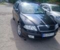 Чорний Шкода Октавія, об'ємом двигуна 2 л та пробігом 320 тис. км за 7603 $, фото 1 на Automoto.ua