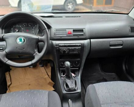 Черный Шкода Октавия, объемом двигателя 1.6 л и пробегом 238 тыс. км за 5500 $, фото 5 на Automoto.ua