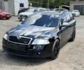 Черный Шкода Октавия, объемом двигателя 2 л и пробегом 212 тыс. км за 8900 $, фото 1 на Automoto.ua