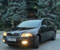 Черный Шкода Октавия, объемом двигателя 1.6 л и пробегом 209 тыс. км за 6400 $, фото 1 на Automoto.ua