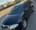 Черный Шкода Октавия, объемом двигателя 1.6 л и пробегом 186 тыс. км за 6799 $, фото 1 на Automoto.ua