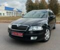 Черный Шкода Октавия, объемом двигателя 1.6 л и пробегом 216 тыс. км за 5800 $, фото 1 на Automoto.ua