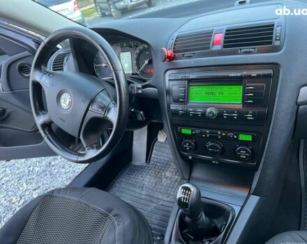 Чорний Шкода Октавія, об'ємом двигуна 2 л та пробігом 307 тис. км за 6990 $, фото 39 на Automoto.ua