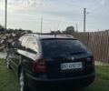 Чорний Шкода Октавія, об'ємом двигуна 2 л та пробігом 306 тис. км за 5799 $, фото 2 на Automoto.ua