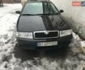 Черный Шкода Октавия, объемом двигателя 1.6 л и пробегом 245 тыс. км за 5900 $, фото 1 на Automoto.ua