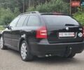 Черный Шкода Октавия, объемом двигателя 2 л и пробегом 245 тыс. км за 9199 $, фото 2 на Automoto.ua